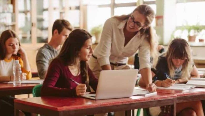 a teacher causing her students to learn